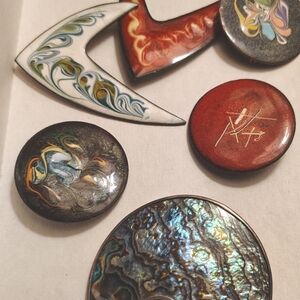 Elegant Red and White Brooch Collection